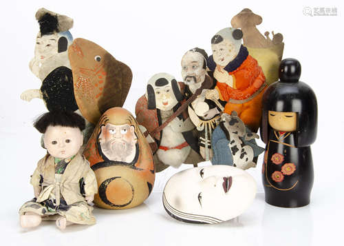 A collection of Japanese works of art, including a Noh theatre pottery mask, a Japanese composite