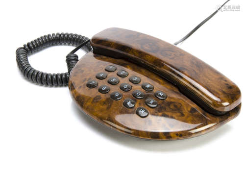 A modern Geemarc Windsor home telephone, in burr walnut effect with push buttons, 20.5cm wide x 14cm