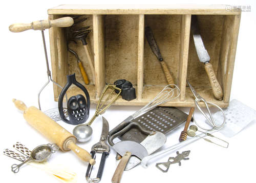 A collection of kitchen implements, contained in a four division handled tray, including a rolling