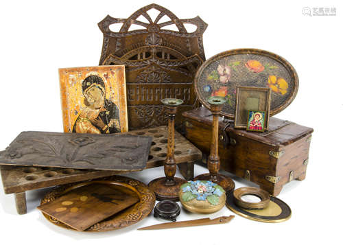 A collection of treen carved items, including a wall mounted German chip carved magazine rack with