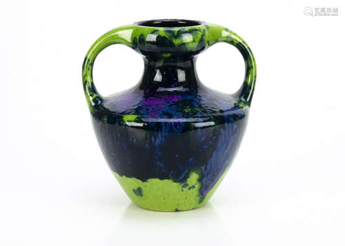 A continental stoneware twin handled vase, the mauve, blue and green drip glaze on a circular body