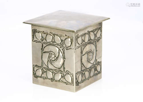 A Scottish school influenced pewter and tin biscuit box, with cushion shaped hinged lid, the