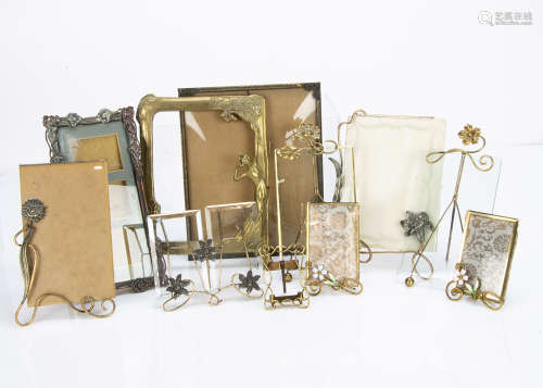 A collection of continental wire work and brass and base metal picture frames, including a pair of