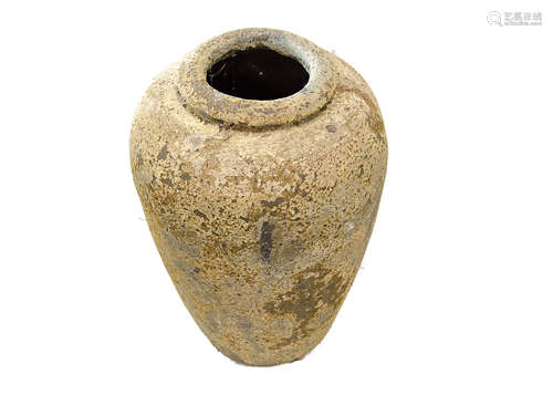 A large stoneware and amphora vase of tapered form, with all over mottled effect from sea erosion,