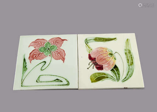 Two German Art Nouveau tiles, relief moulded by Haager Horth, floral decorated in colours against