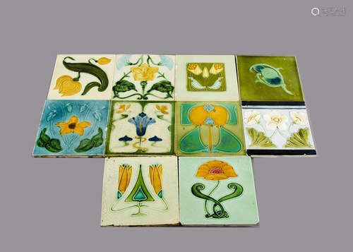 Ten British Art Nouveau relief moulded tiles, all with floral decoration, unknown makers, 15cm