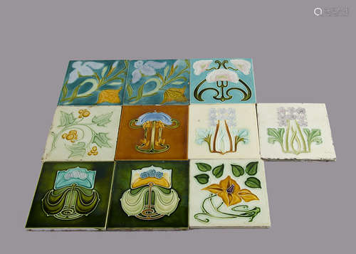 A set of ten Corn Art Nouveau relief moulded tiles, some paired decoration, all stylised floral