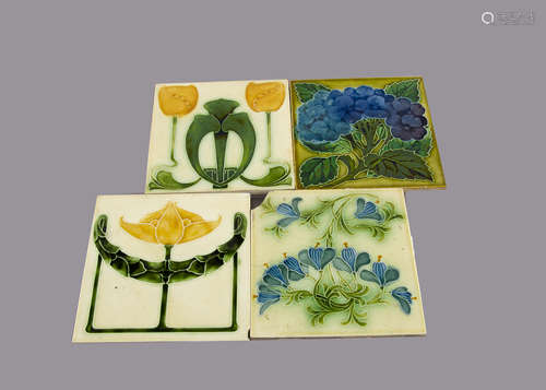 Four Pilkington Art Nouveau relief moulded tiles, with floral decoration, 15.5cm square Crazed^