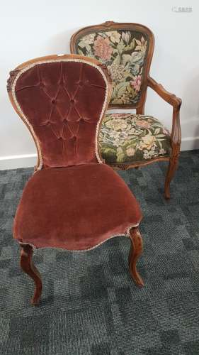 A continental fruitwood carved open armchair, with upholstered woolwork cushion seat and back with
