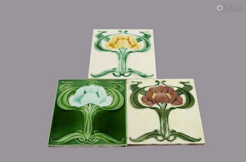 Three Henry Abraham Ollivant Art Nouveau relief moulded tiles, all matching single floral design