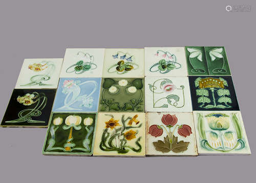 A collection of fourteen Henry Richards Art Nouveau relief moulded tiles, all decorated with