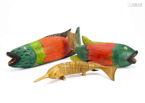 Three Nigerian painted fish, one articulated, longest 46cm (3)