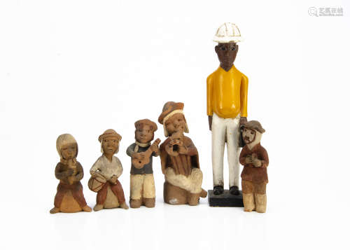 A Yoruba painted figure, height 32cm, together with five terracotta musicians (6)