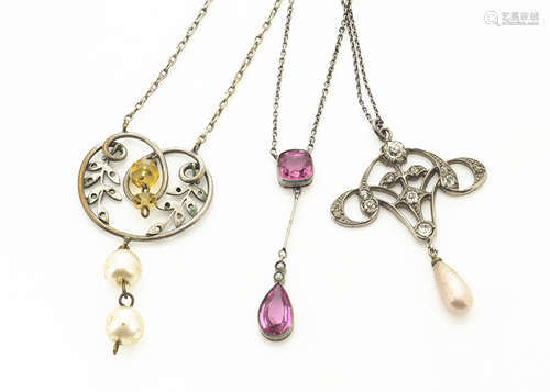 An Art Nouveau style paste set pendant, with simulated pearl drop, another similar and a drop