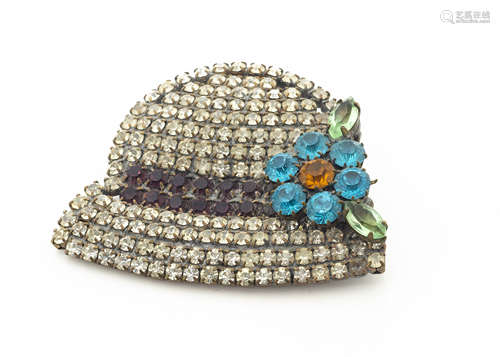 An Art Deco paste set brooch, modelled as a bonnet with floral bow, 6cm x 5cm