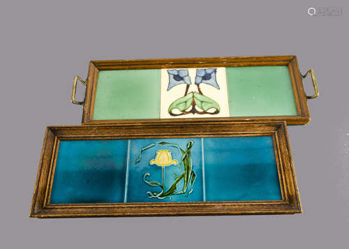 A British Art Nouveau relief moulded framed tile panel, with central daffodil decoration by Alfred