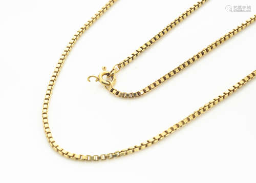 A 14ct gold fine link necklace, the cube links with circular clasp, 34cm together, 14.7g