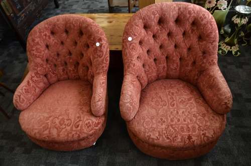 A pair of late 19th Century upholstered tub chairs, the button spoon back chairs with a metal