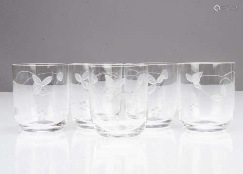A set of five Minton wheel engraved goblets, of cylindrical form with tapered bases engraved with