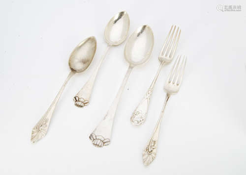 Two Danish white metal planished spoons, the ovoid bowls and slender stems with tapering