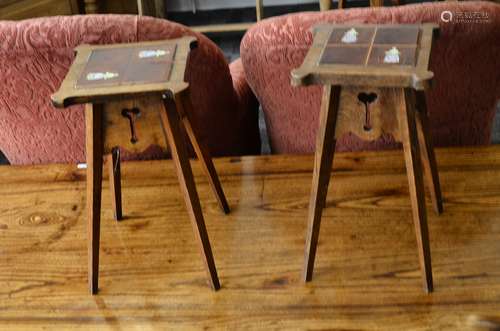 A pair of Arts and Crafts oak and tiled top occasional tables, the square tops with protruding