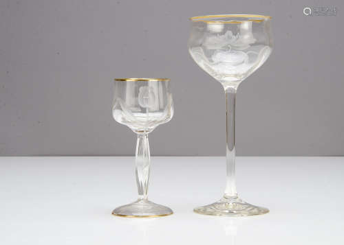 A continental Art Nouveau colourless engraved wine goblet, with floral decoration to the optic