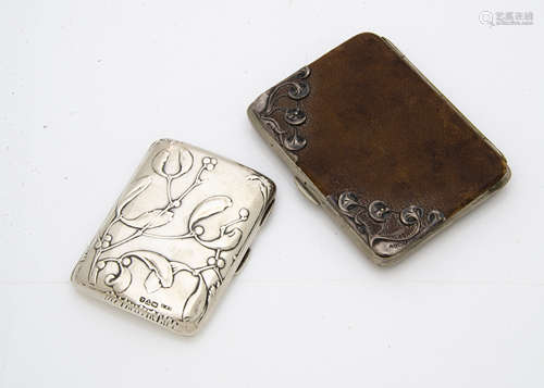 A Victorian silver cigarette case, in the Art Nouveau taste with embossed mistletoe decoration,