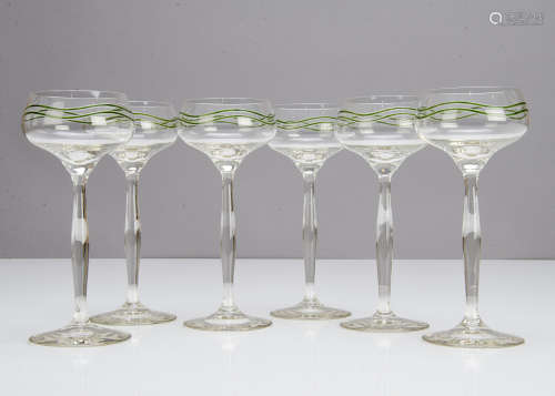 A set of six Art Nouveau German hock glasses, the colourless bowl and shaped stem decorated with two