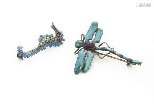 A continental silver and enamel dragonfly brooch, with red enamel abdomen and blue/green wings and