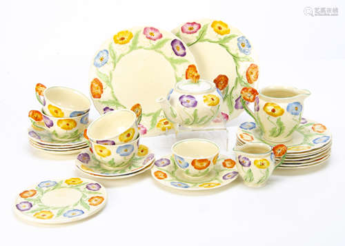 A collection of Grindley Art Deco pottery teaware, of moulded design, of floral decoration, each