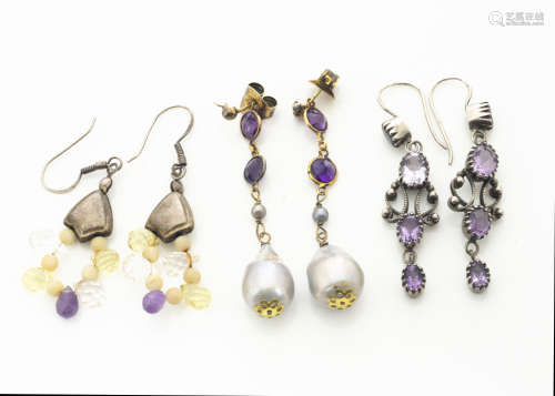 A pair of amethyst and baroque pearl drop earrings, the rose cut amethysts supporting oval baroque