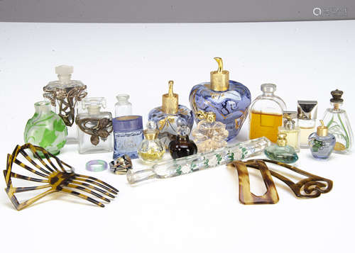 A collection of early 20th Century and later miniature perfume bottles, including a flattened