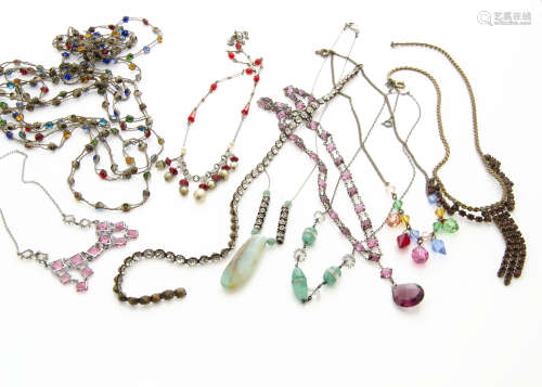 A collection of early 20th Century and later paste set necklaces, including gilt metal enamel floral