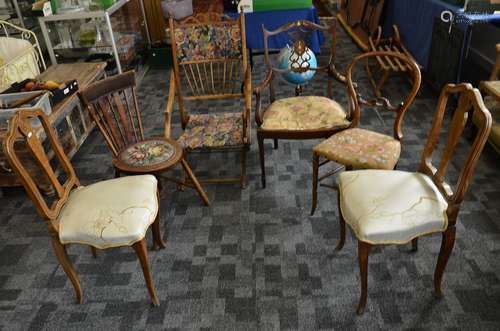 A collection of six various chairs, including an Edwardian inlaid armchair with stuff over seat