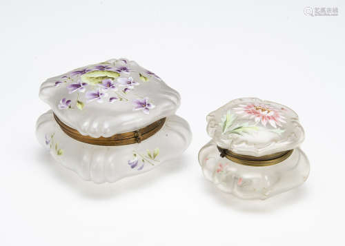 Two Art Nouveau frosted glass and enamel decorated dressing table boxes and covers, both with hinged
