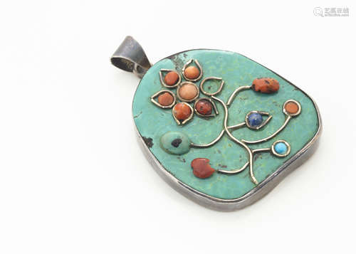 A turquoise, coral and lapis lazuli white metal pendant, of floral design, bale marked 925, 6.2cm