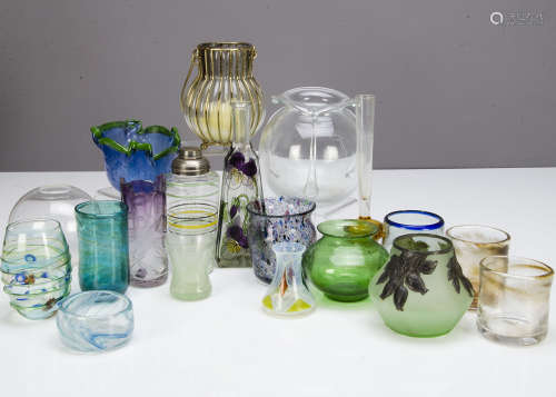 A collection of contemporary glassware, including a painted glass cocktail shaker, various hand