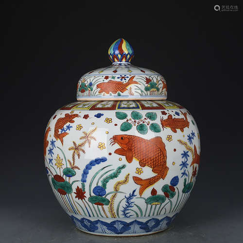 A CHINESE BLUE AND WHITE FAMILLE VERTE JAR WITH FISH PATTERN