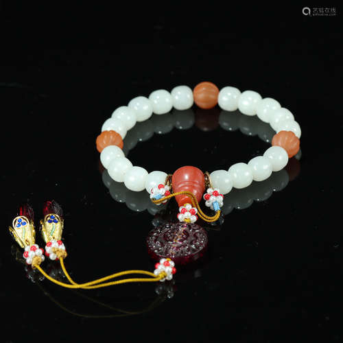 A CHINESE WHITE JADE BEADS HAND STRING