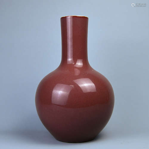 A RED GLAZE CELESTIAL BOTTLE