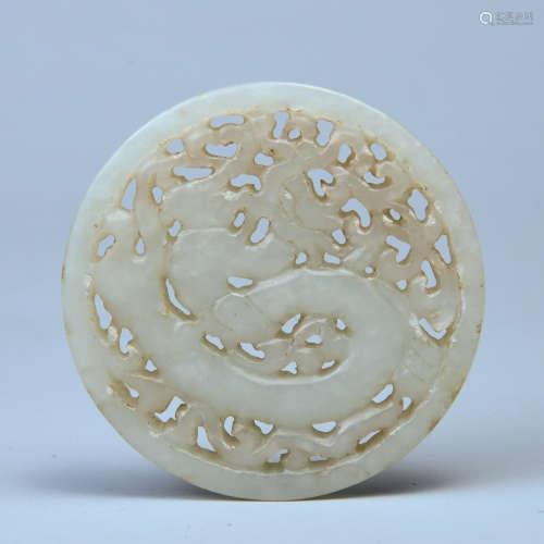 A HETIAN WHITE JADE PLATE  MADE OF SEED MATERIAL AND THROUGH CARVED WITH GRAGON PATTERNS
