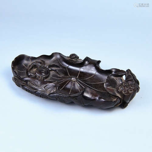 A RED SANDALWOOD PEN WASH SHAPED WITH LOTUS LEAF