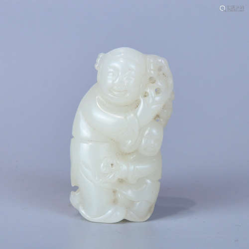 A HETIAN WHITE JADE BOY-SHAPED HANDLE PIECE MADE OF SEED MATERIAL