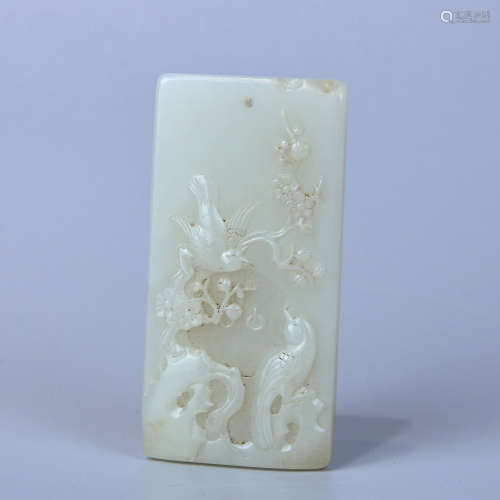 A HETIAN WHITE JADE PLATE MADE OF SEED MATERIAL AND CARVED WITH MAGPIE ASCENDING PLUM