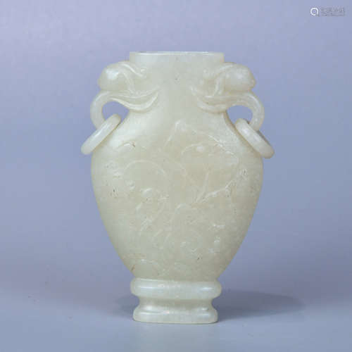 A HETIAN WHITE JADE SEED-MAKING BOTTLE WITH DOUBLE EARS HANGING DOUBLE LIVING RINGS AND CARVED WITH BOYS