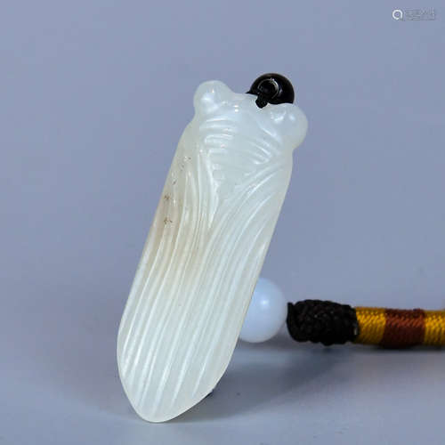 A HETIAN WHITE JADE CICADA MADE OF SEED MATERIAL