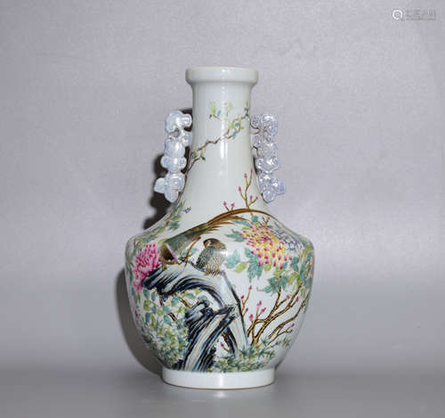 A POWDER ENAMEL BOTTLE  PAINTED WITH FLOWERS AND BIRDS