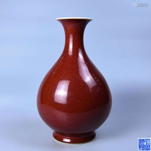 A SACRIFICIAL  RED GLAZE OKHO SPRING BOTTLE IN QIANLONG PERIOD