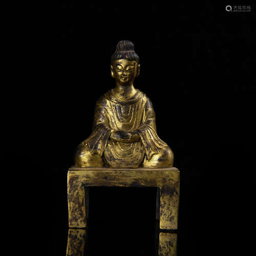 A COPPER-GILDED BENCH BUDDHA