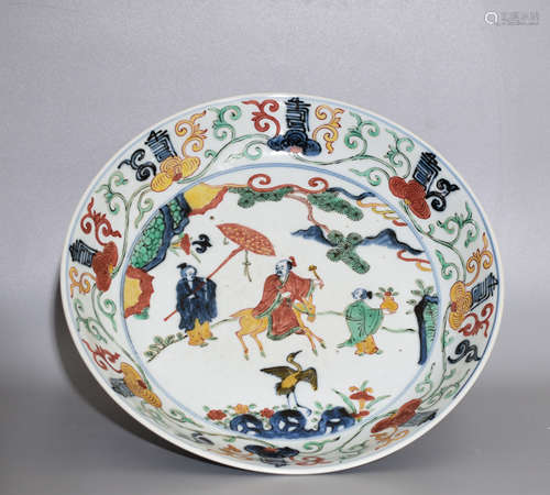 A MUTICOLOURED PLATE WITH CHARACTERS